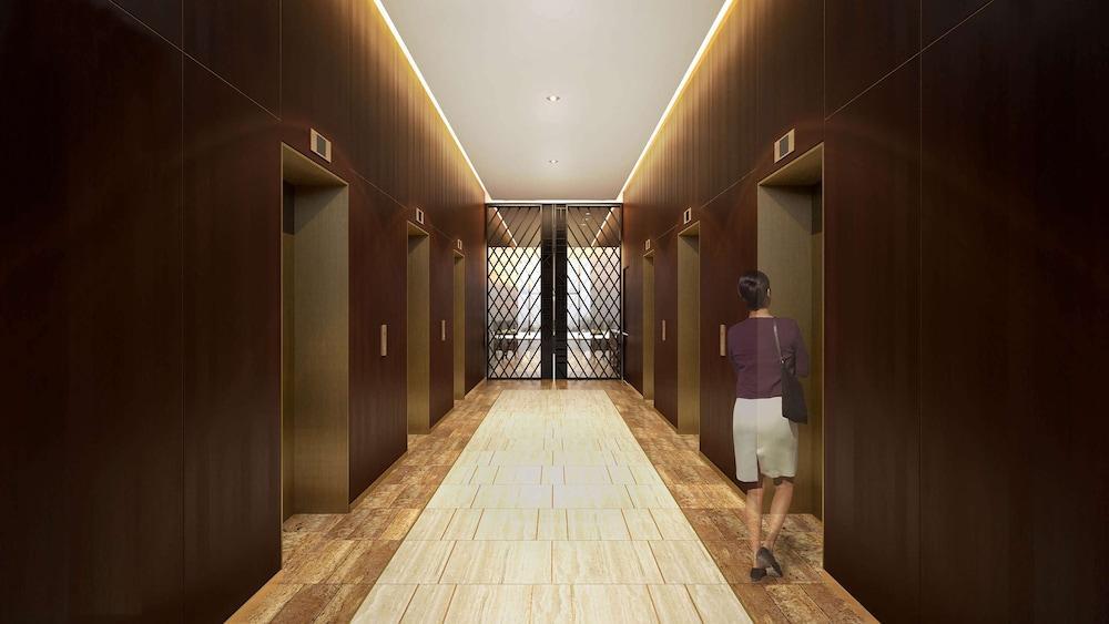 Aleph Doha Residences, Curio Collection By Hilton Dış mekan fotoğraf The elevators