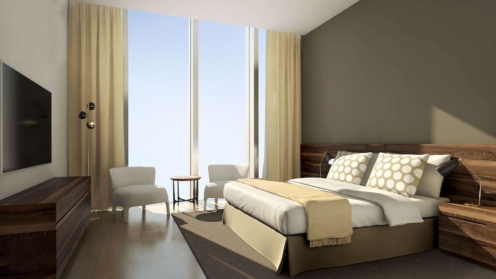 Aleph Doha Residences, Curio Collection By Hilton Dış mekan fotoğraf A bedroom