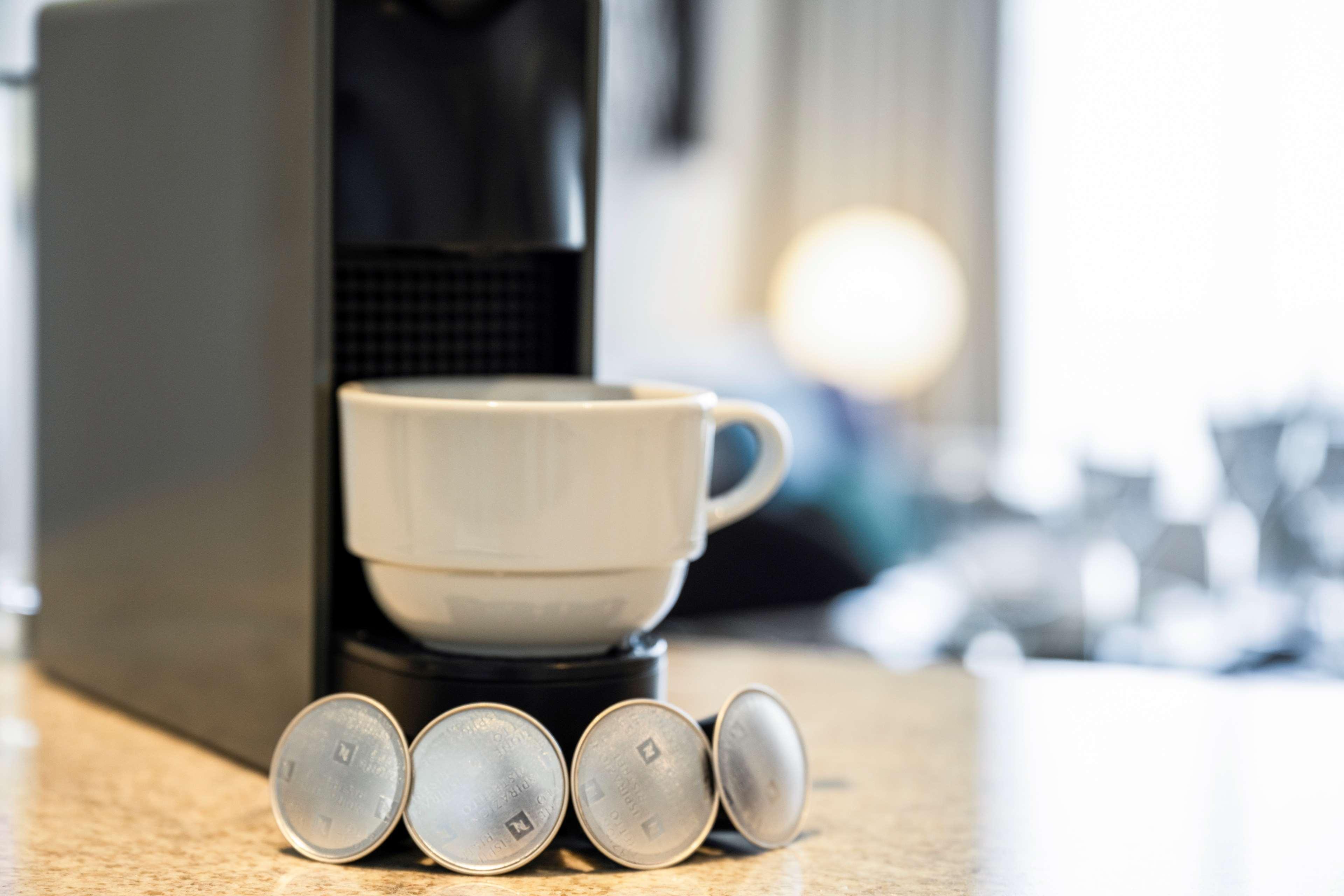 Aleph Doha Residences, Curio Collection By Hilton Dış mekan fotoğraf A Nespresso machine