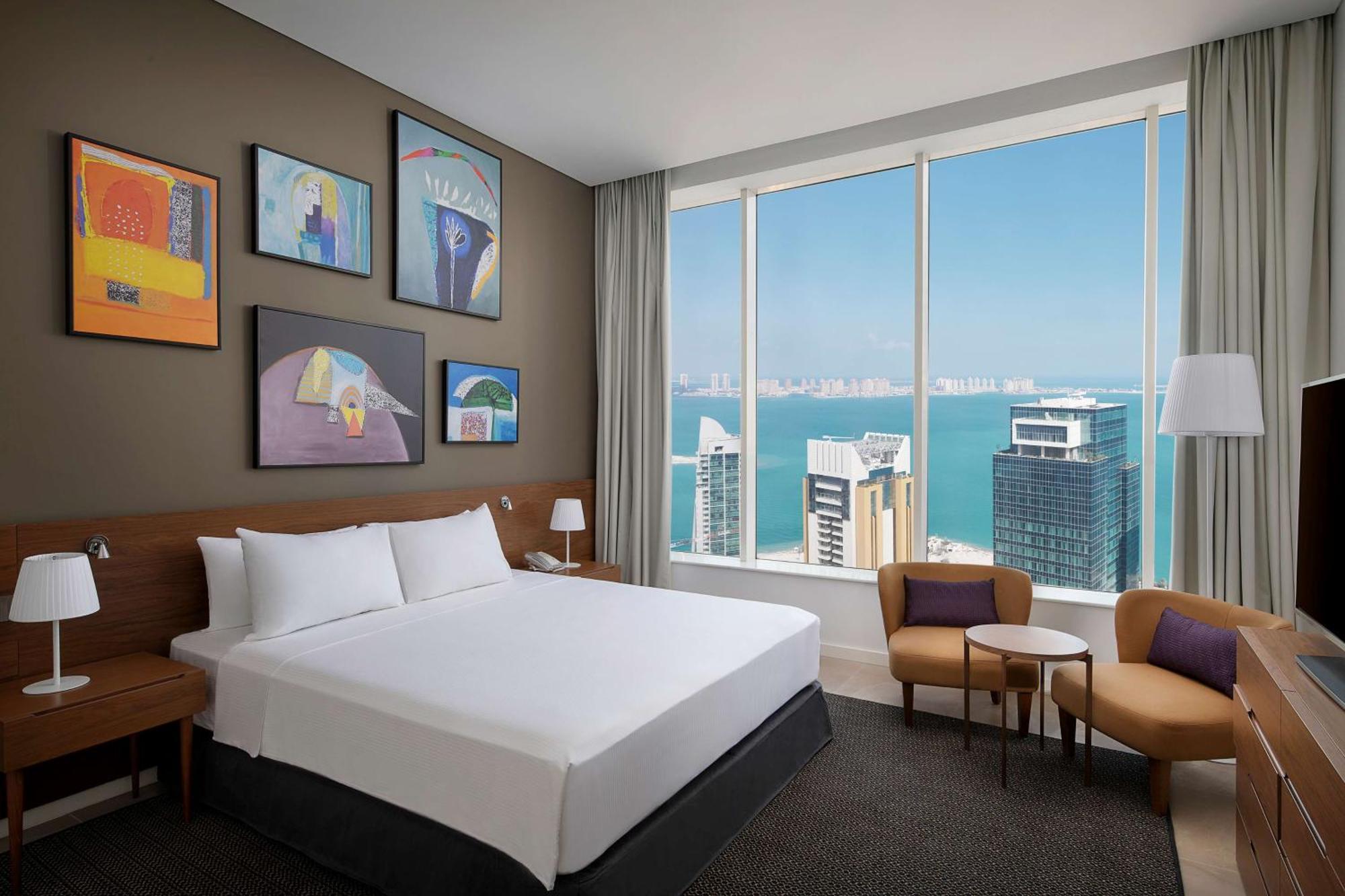 Aleph Doha Residences, Curio Collection By Hilton Dış mekan fotoğraf A guest room at the hotel