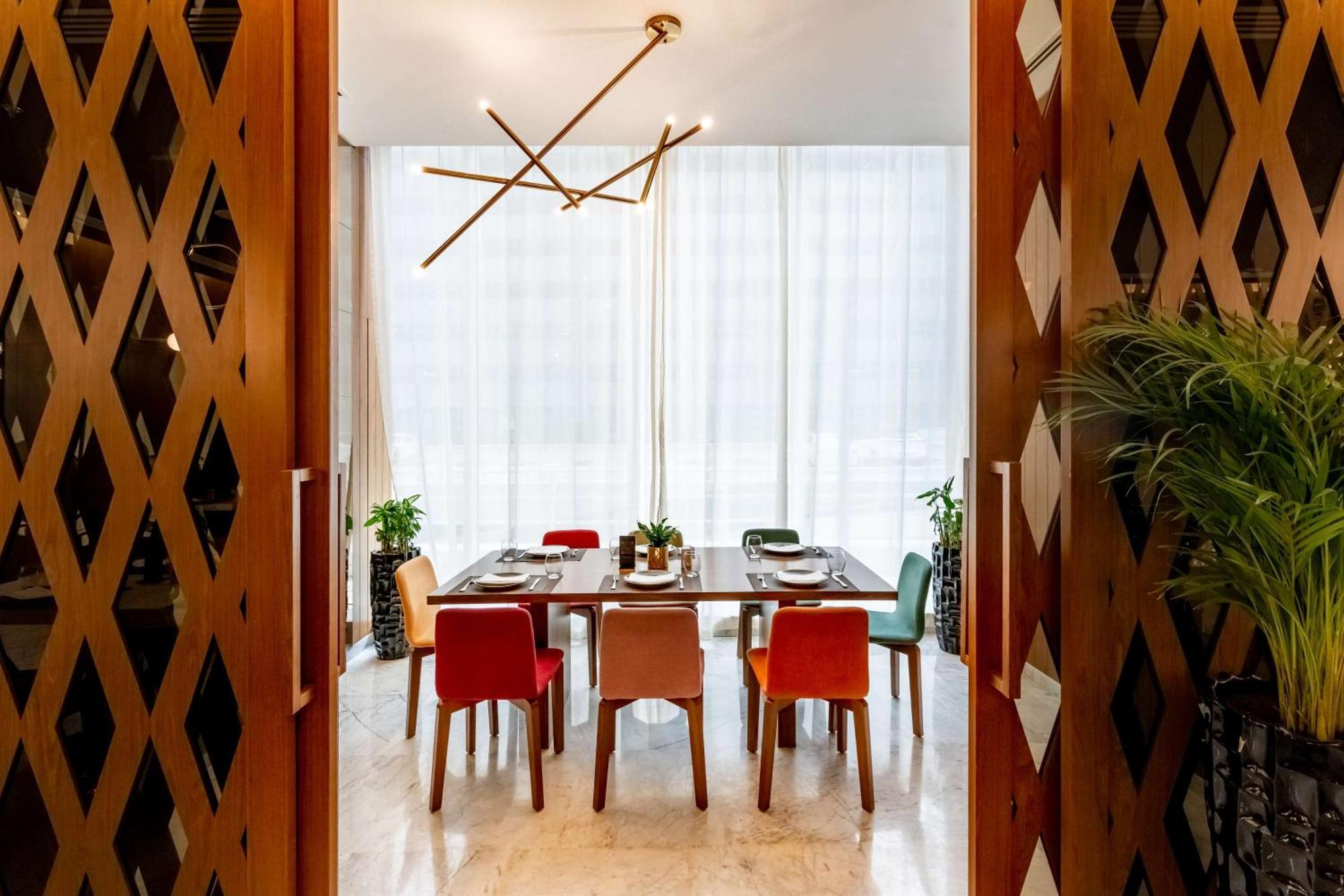 Aleph Doha Residences, Curio Collection By Hilton Dış mekan fotoğraf Dining room
