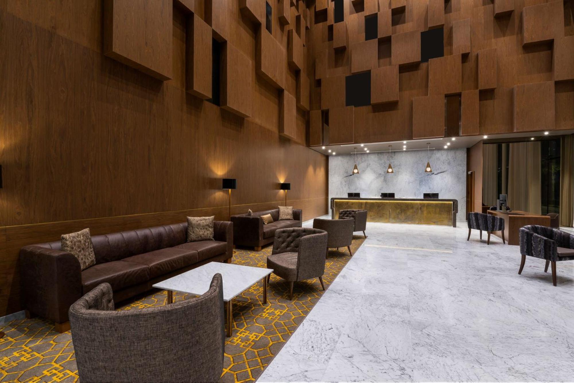 Aleph Doha Residences, Curio Collection By Hilton Dış mekan fotoğraf The lobby of the hotel
