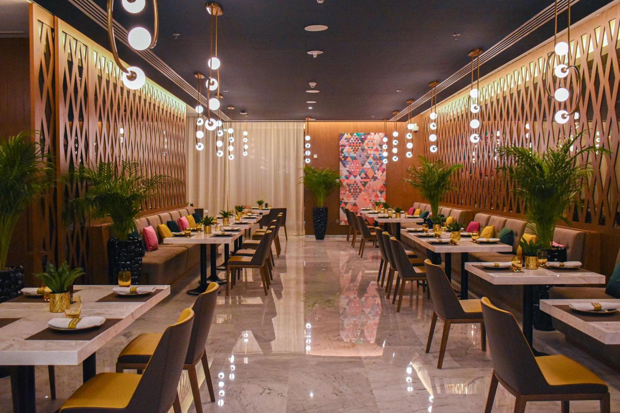Aleph Doha Residences, Curio Collection By Hilton Dış mekan fotoğraf Restaurant interior